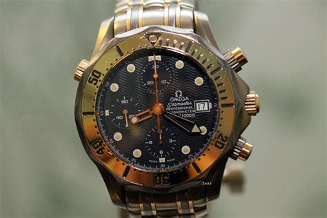 omega seamaster professional chronograph titanium 18k rose gold 2296.80|omega 2225.80 Seamaster pro.